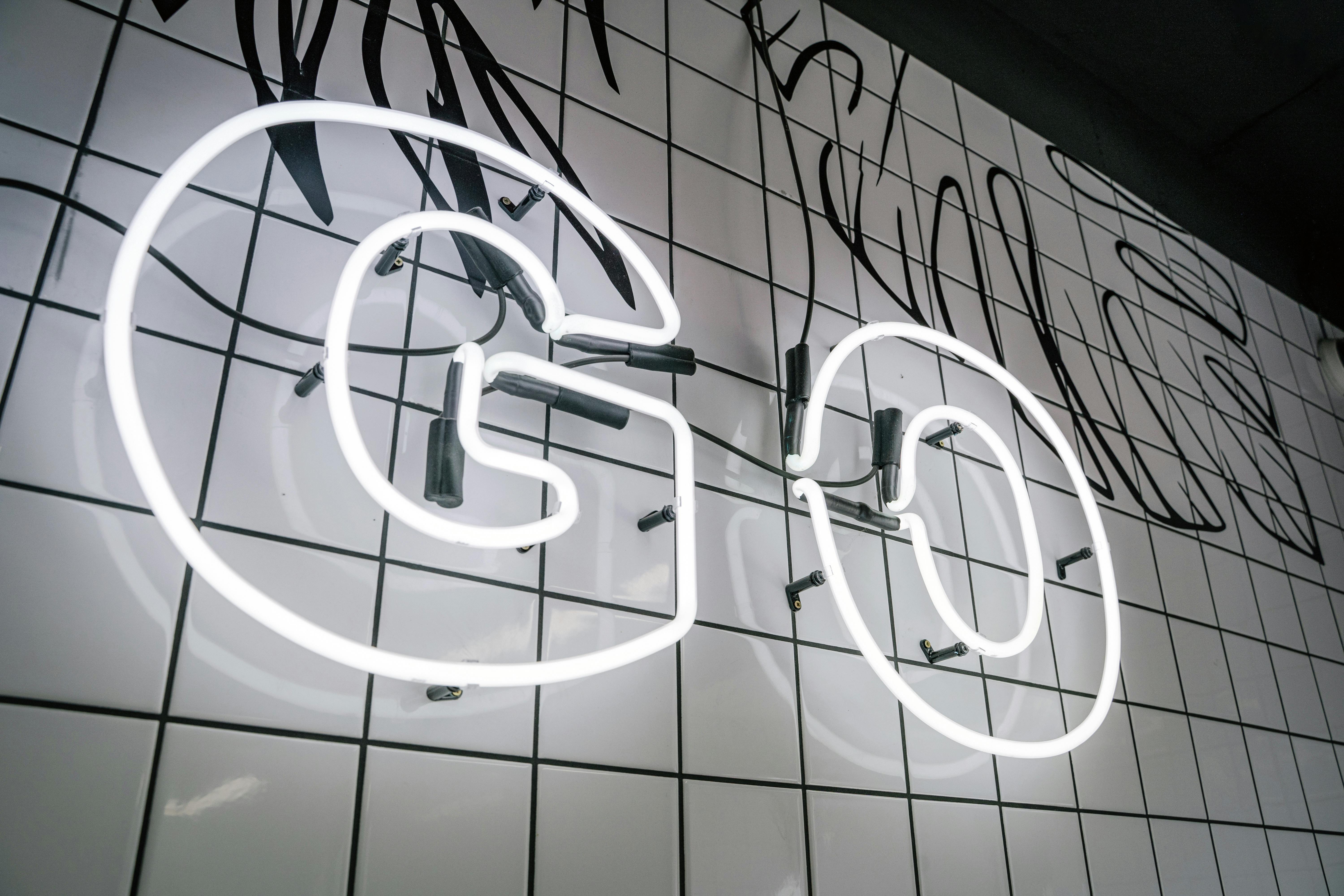 A neon sign saying 'GO'